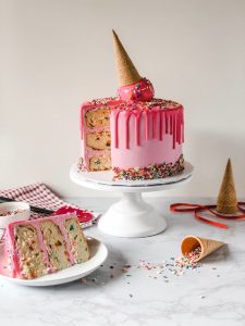 Custom Cake pink with ice cream cone on top